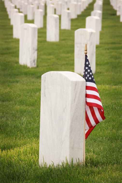 flag of u s a standing near tomb
